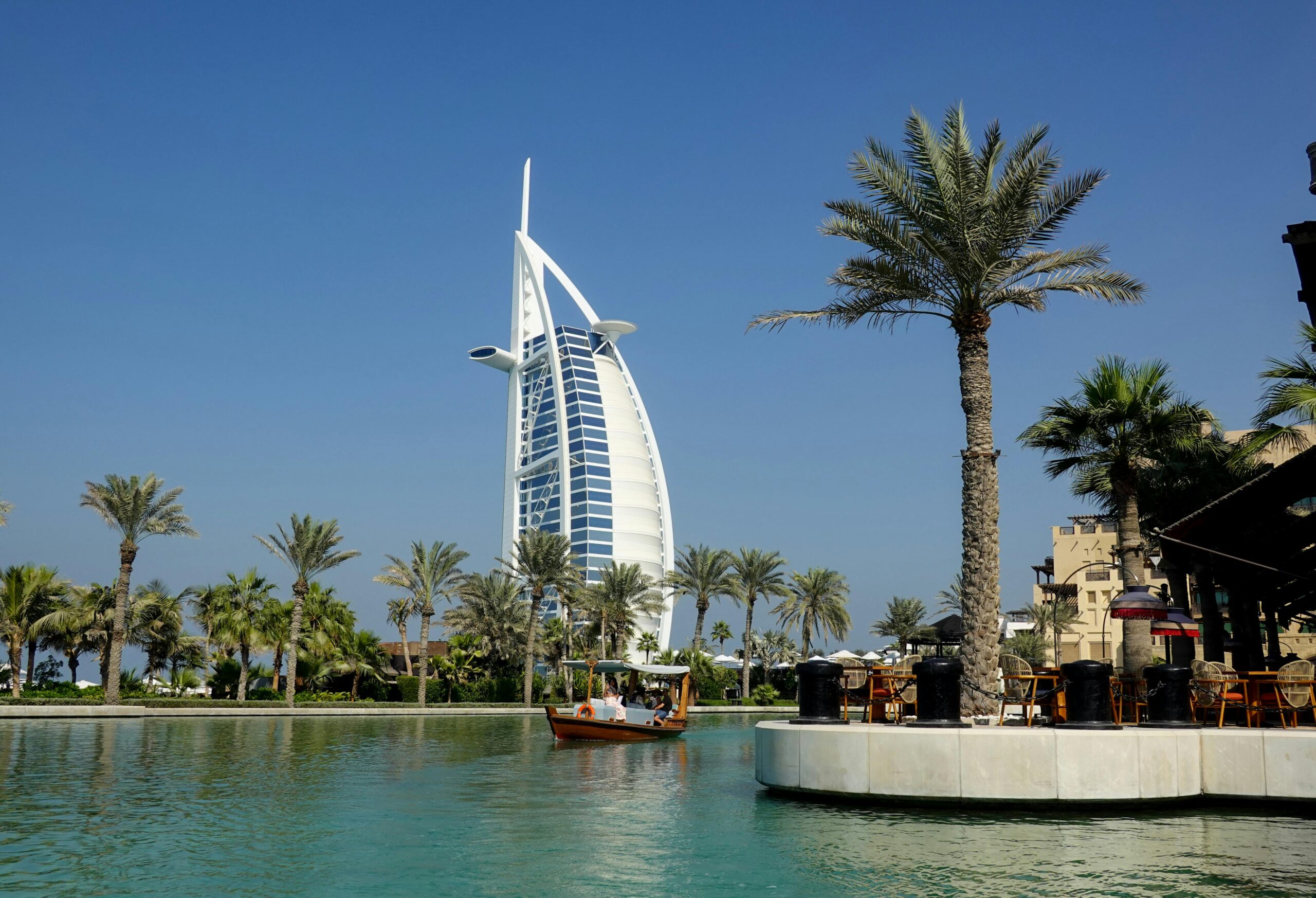 Burj Khalifa at sunset overlooking Downtown Dubai skyline and Dubai Fountain